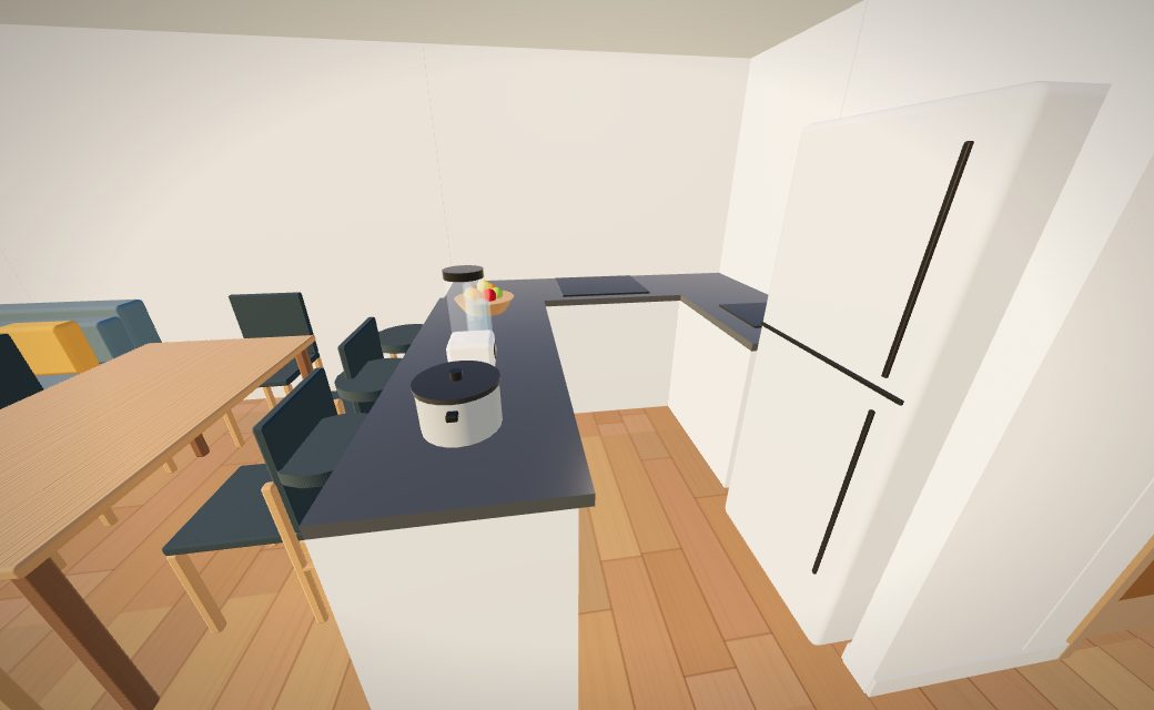 Cocina del departamento con olla, licuadora, jarra y frutero sobre el mostrador